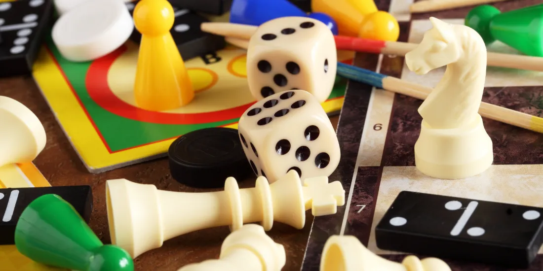 Variety of board game pieces on a table
