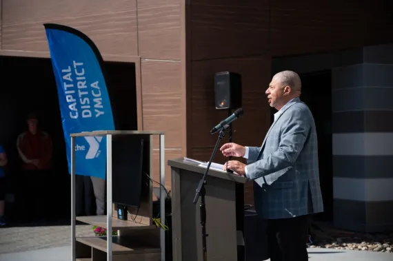CDYMCA CEO Dave Brown speaks at SSY ribbon cutting