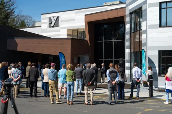 Crowd facing SSY ribbon cutting