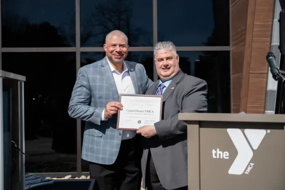 CDYMCA receives a plaque at SSY ribbon cutting