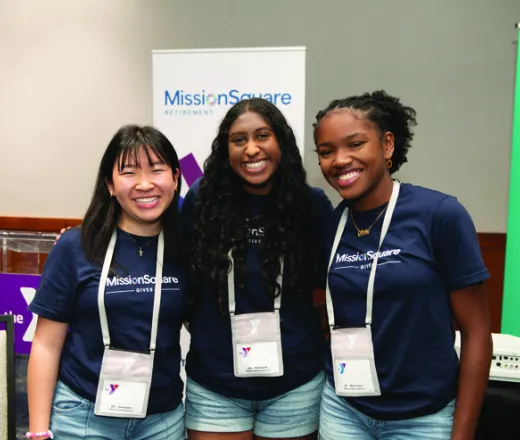 Three girls smiling