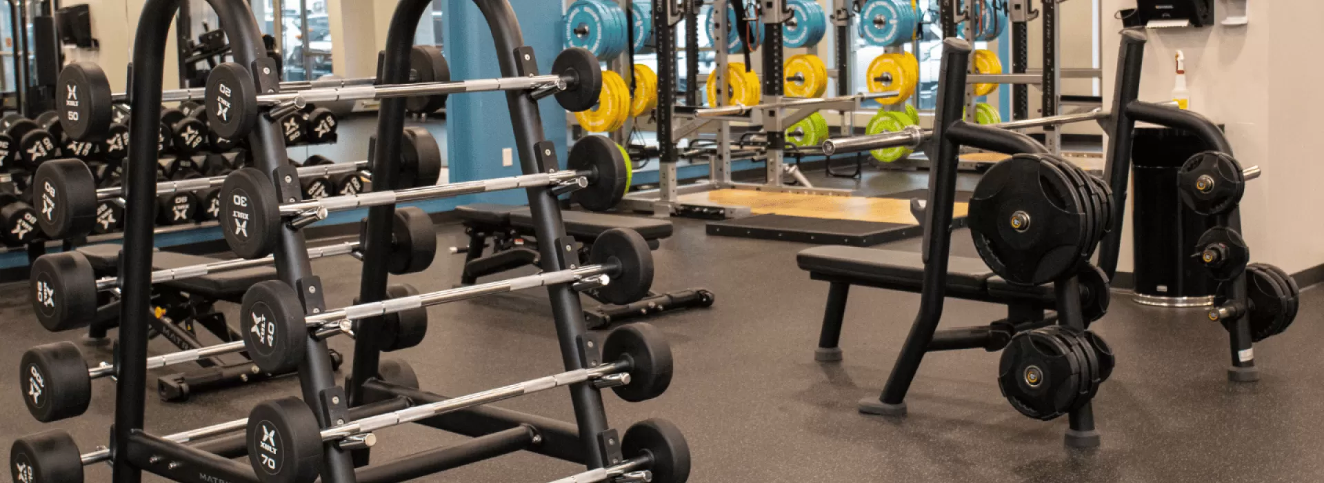 View of full wellness center with weight benches